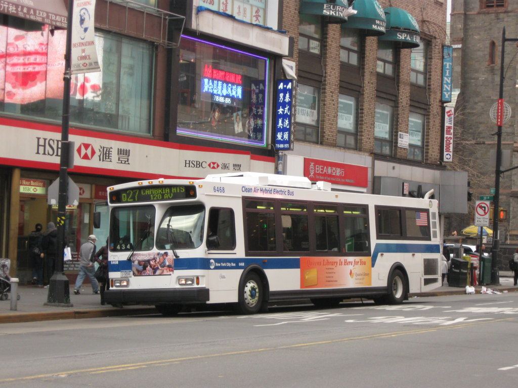 city bus on busy street